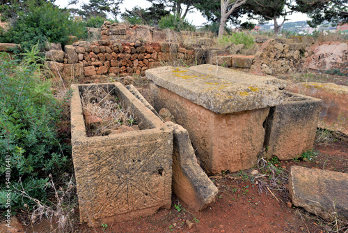 ROMAN AND EARLY CHRISTIAN SARCOPHAGI AT THE ARCHEOLOGICAL SITE OF TIPAZA IN ALGERIA photo