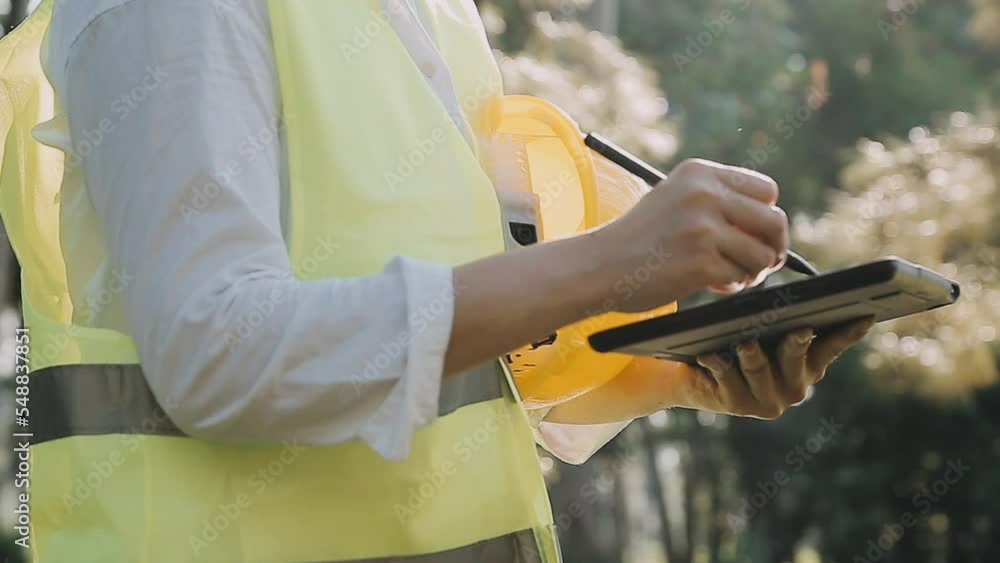Construction engineer working at blueprint to build large commercial buildings in office. Engineering tools and construction concept. Construction engineer working at blueprint to build large commercial buildings in office. Engineering tools and construction concept.