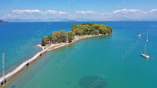 Fototapeta Naklejka Na Ścianę i Meble -  Aerial drone photo of small islet of Koukoumitsa in picturesque seaside village of Vonitsa, Western Greece