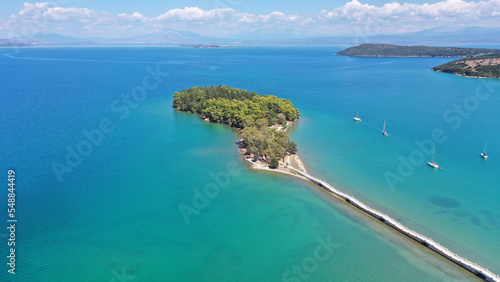 Aerial drone photo of small islet of Koukoumitsa in picturesque seaside village of Vonitsa, Western Greece photo