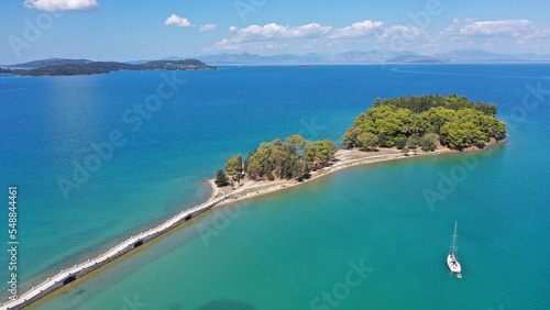 Aerial drone photo of small islet of Koukoumitsa in picturesque seaside village of Vonitsa, Western Greece