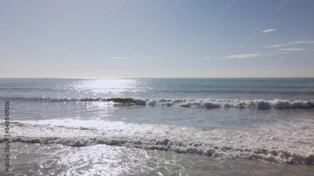 Serfists in the sea between the waves Serfists in the sea between the waves