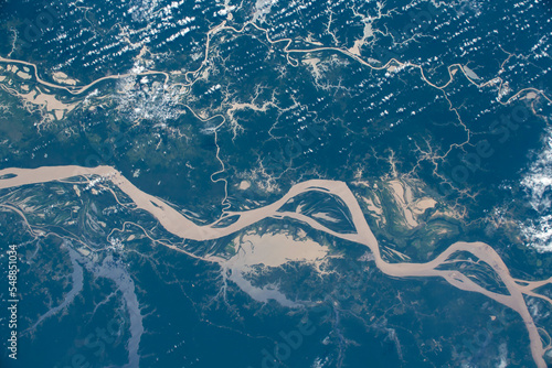 Aerial view of the Amazon River in Brazil. Digitally enhanced. Elements of this image furnished by NASA.