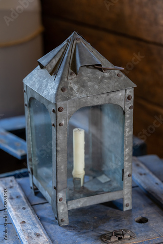 Vintage galvanized steel lantern with candle inside in a  building at Fort Alexandria represents a fort built in 1852. Runestone Museum in Alexandria, Minnesota photo