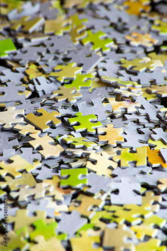 background of puzzle pieces in vertical position. selective focus. copy space. resource for social networks.