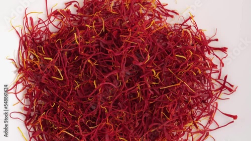 Heap of Moroccan saffron isolated on white background.