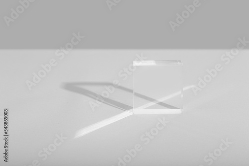clear glass and plexiglass on a white background with hard light