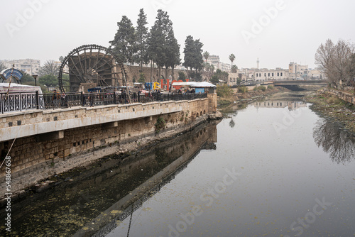 Giant wooden waterwheels aka Norias, on the Orontes River, Hama, Syria photo