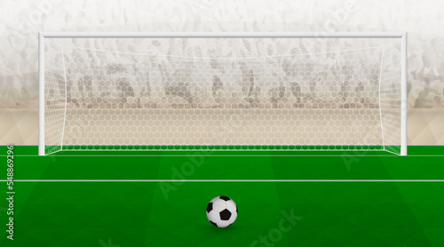 Preparing for the penalty kick at the football stadium, soccer ball and gate on the green soccer field.