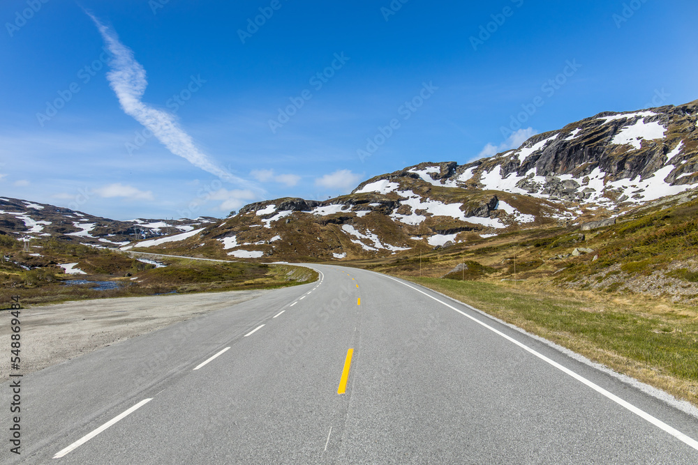 Naklejka premium Mountain pass road Strandavatnet through the highlands of Norway