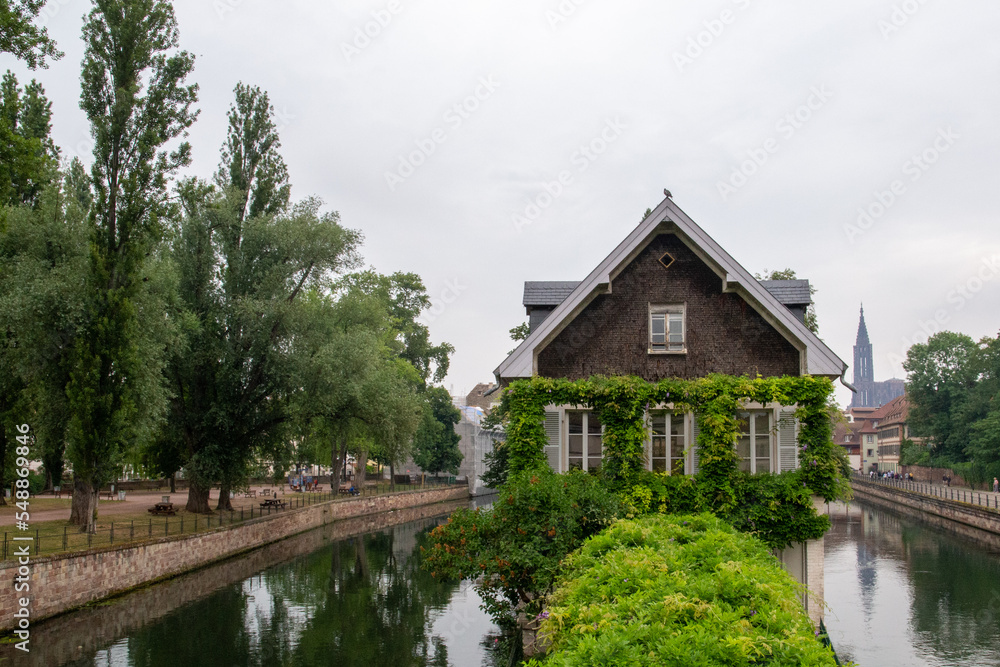 House surrounded by two canals and with a green area in front House surrounded by two canals and with a green area in front