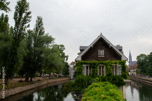 Bilde på lerret House surrounded by two canals and with a green area in front