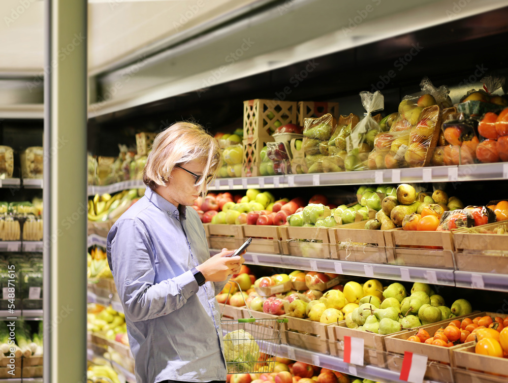 Man buying fruits at the market