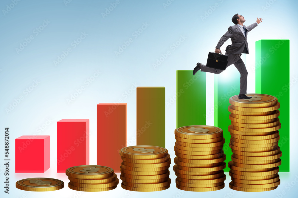 Businessman in the growth concept with coins chart Businessman in the growth concept with coins chart