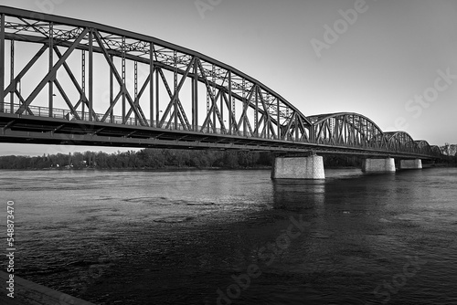The Vistula River and the steel structure of the road bridge in the city of Torun