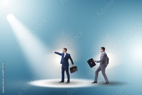 Business people under the spotlight