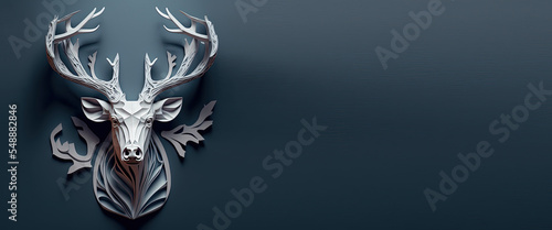 Reindeer head papercraft on a grey-blue background photo