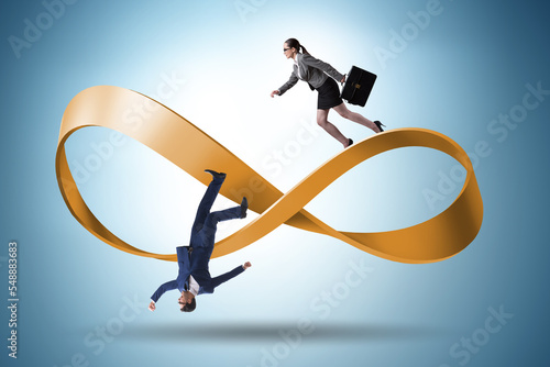 Business people running on the endless loop photo