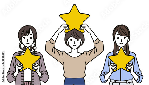 星を持って評価する女性