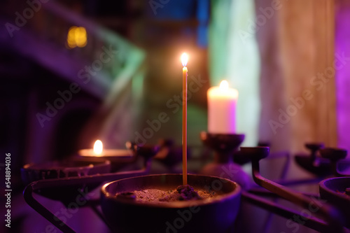 A close-up photo of church candles. Orthodox christian religious traditions.