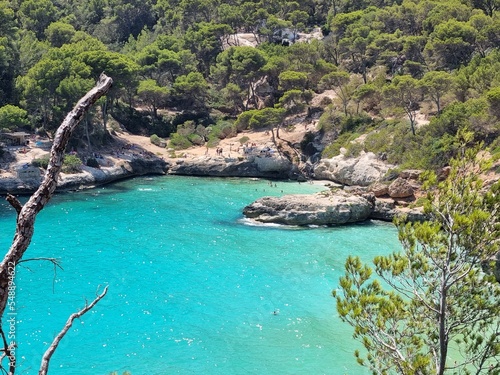 View of turquoise sea in beautiful bay Cala Mitjaneta in Menorca