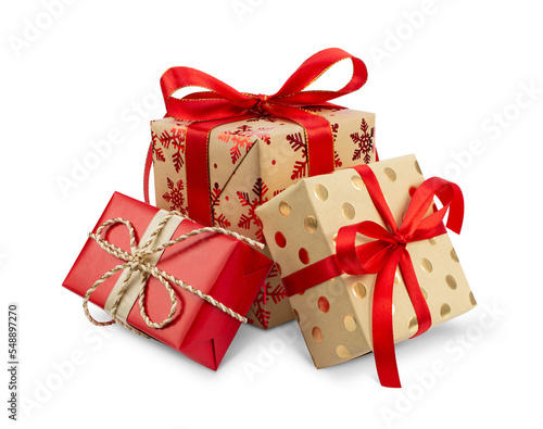 Gift boxes with the red ribbons in eco paper isolated on the white background photo