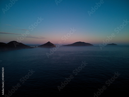 Drone photo from Fingal Beach to Tomaree Mountain in Port Stephens, just prior to sunrise.