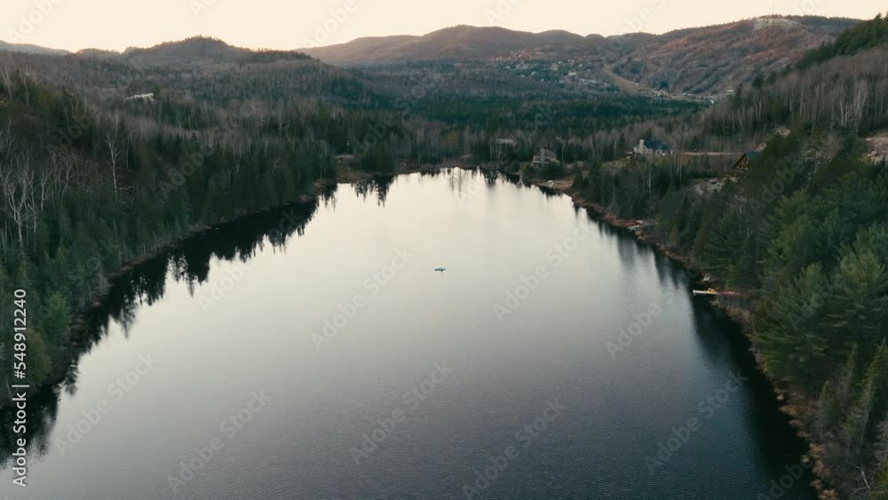 Still Water Of A Lake With Mirror Reflection During Sunset. Aerial Wide Shot Still Water Of A Lake With Mirror Reflection During Sunset. Aerial Wide Shot
