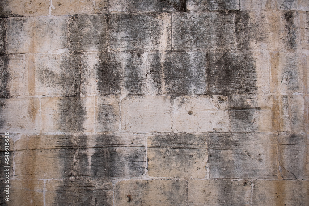 Obraz premium historic stone wall. decrepit ancient floor.