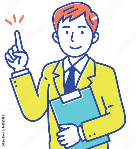 書類を持って指差しする若い男性ビジネスマン