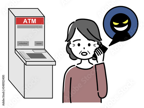 銀行ATMの前で詐欺師から電話で指示される高齢女性（上半身）