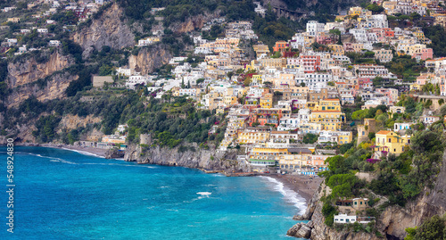 Fototapeta Naklejka Na Ścianę i Meble -  Touristic Town, Positano, on Rocky Cliffs and Mountain Landscape by the Tyrrhenian Sea. Amalfi Coast, Italy.