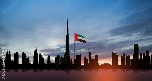Photography United Arab Emirates flag and Dubai skyline view at sunset
