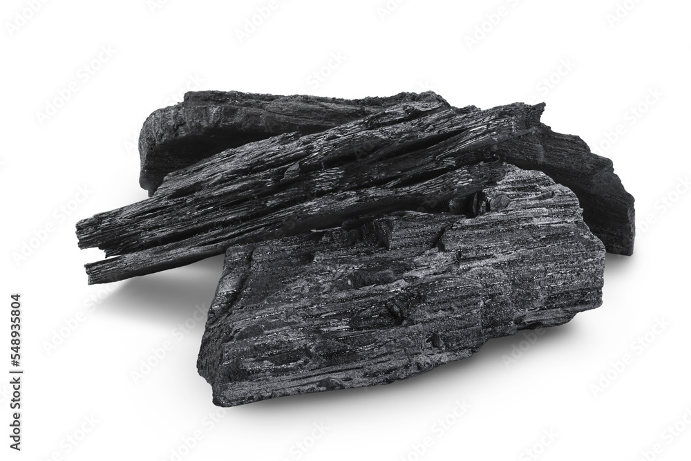 Natural wooden charcoal isolated on white background with full depth of field Natural wooden charcoal isolated on white background with full depth of field