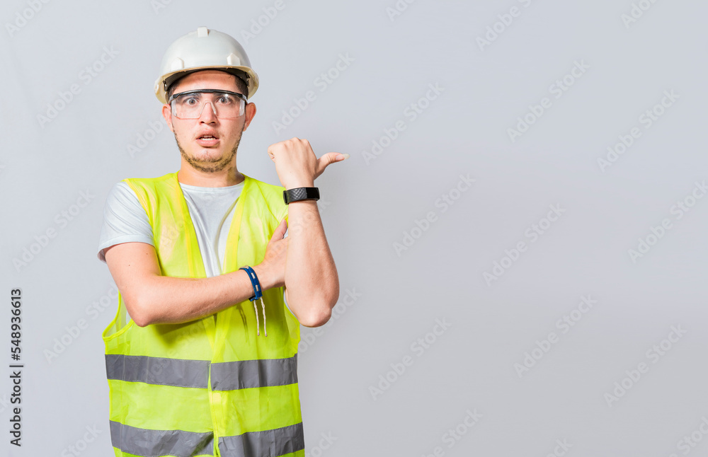 Amazed Engineer pointing to side. Surprised engineer pointing finger to the right, Surprised engineer pointing to the side, Surprised face construction worker pointing at an advertisement Amazed Engineer pointing to side. Surprised engineer pointing finger to the right, Surprised engineer pointing to the side, Surprised face construction worker pointing at an advertisement