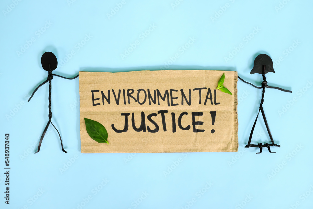 Environmental justice, ecological and climate justice concept. People stick figures protesting while holding a carton placard.