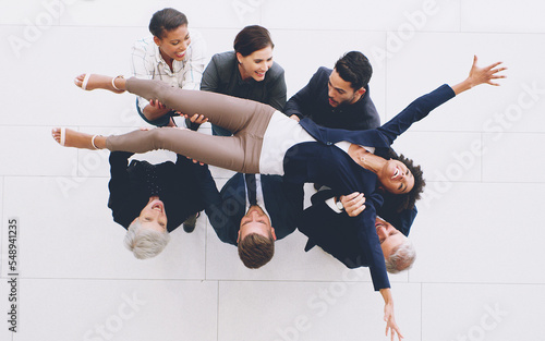 Obraz na plátně Top view, business group and carrying woman with joy for successful deal and celebration in the office