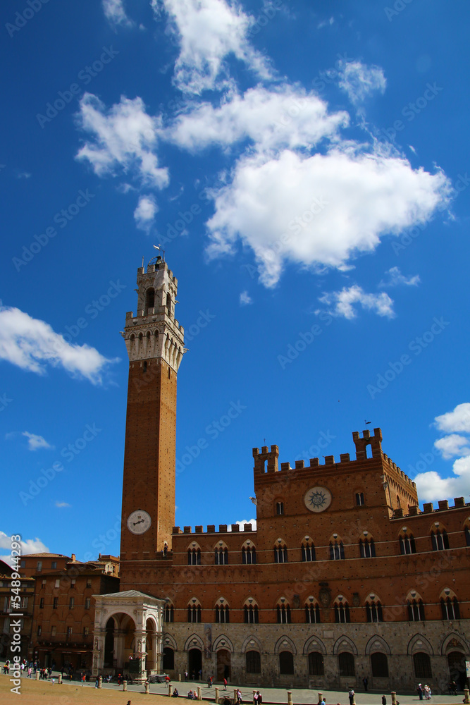The Palazzo Pubblico is centrally located on the former market square of Siena, the Piazza del Campo,  Tuscany, Italy 
