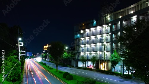 A night timelapse of the traffic jam at the downtown street in Tokyo wide shot photo