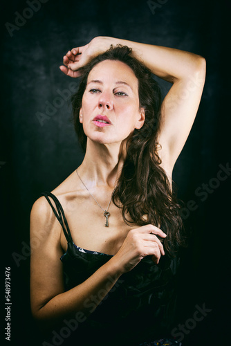woman with lingerie body in romantic attitude II photo