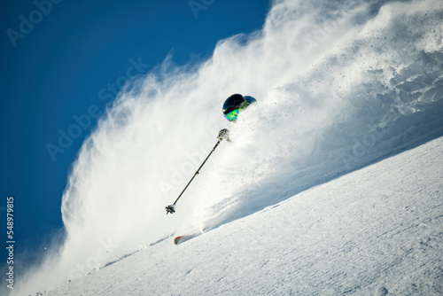 Man skiing in deep powder snow, Zauchensee, Salzburg, Austria photo