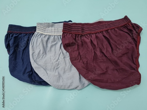 Men's underpants in red, blue and gray made of thread