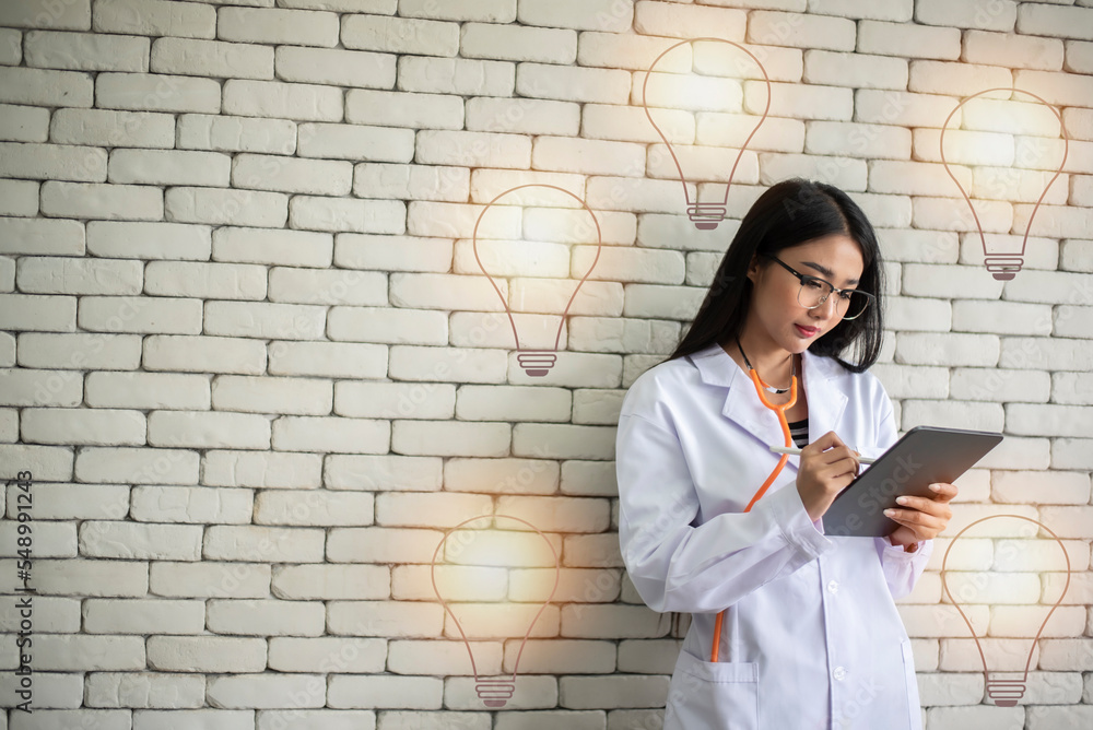 Young doctor woman use tablet with creative idea. Young doctor woman use tablet with creative idea.