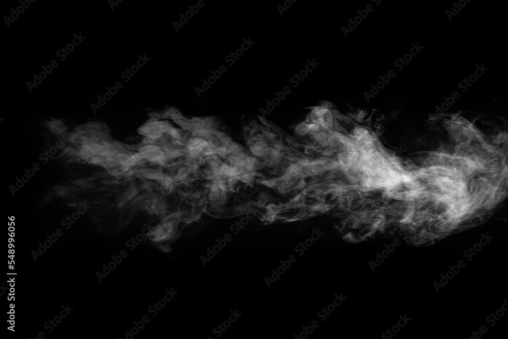 Naklejka premium White steam on an isolated black background.