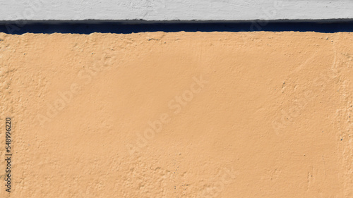 yellow wall and white detail with shadow - yellow texture