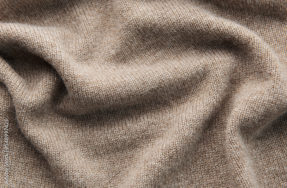 Warm cashmere fabric as background, top view Warm cashmere fabric as background, top view
