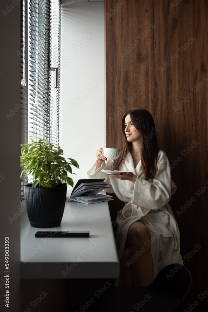 woman drinking coffee in the morning at home. Beautifull morning at cozy home woman drinking coffee in the morning at home. Beautifull morning at cozy home
