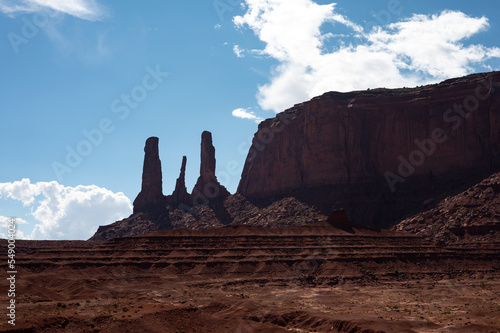 Nice desert landscape with rocky Monument Valley. It's a sunny summer day with blue sky