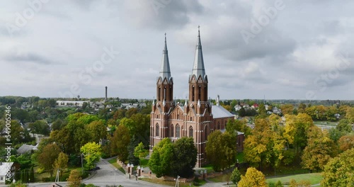 Drone view of Church in Anyksciai, Lithuania, eastern Europe. City Church are visible in the frame. High quality aerial footage. photo