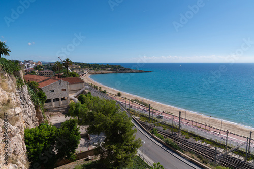 Fototapeta Naklejka Na Ścianę i Meble -  Tarragona Spain beach coast and railway Costa Daurada Catalonia with blue Mediterranean sea